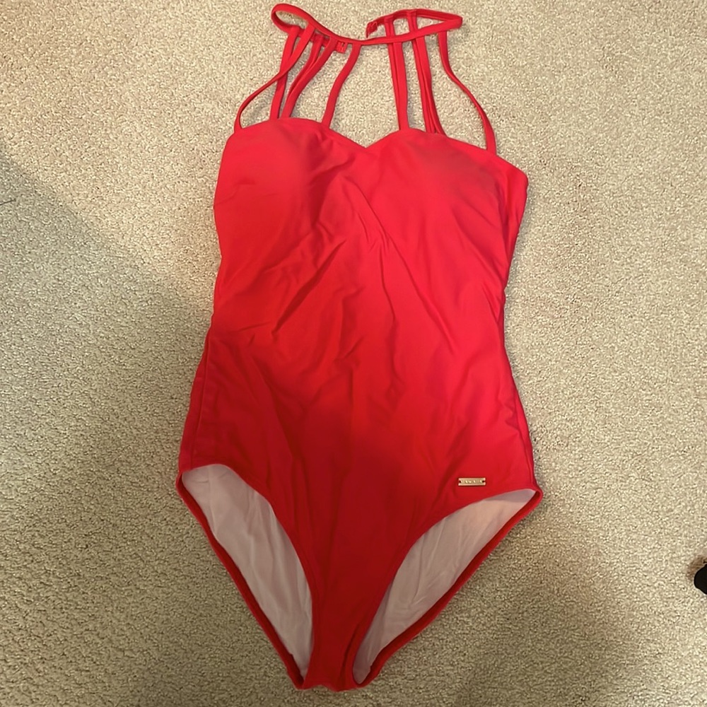 Red Victoria’s Secret strappy swimsuit